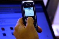 Главный принцип PortWise - использование для задач аутентификации мобильных телефонов и КПК 