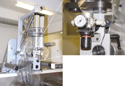 На перекрёстные штанги устройства переворота полотна в машинах Nilpeter подаётся воздух. Образовавшаяся воздушная подушка уменьшает трение полотна и не даёт ему сползти вниз. Крупно: система регулирования давления воздуха в системе