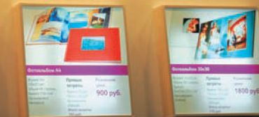 Xerox прямо на световых дисплеях, как говорится, с цифрами в руках, доказывал всем выгодность работы с фотопродуктами нового поколения