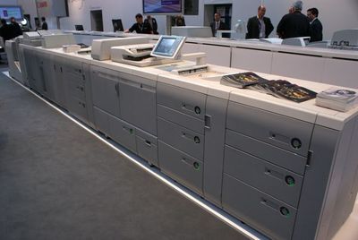 Законченная линия по выпуску брошюр на базе монохромной Canon imagePRESS 1135 