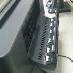 На случай замятия бумаги, подаваемой из кассеты, на задней панели есть откидывающаяся часть. Правда, чаще всё же приходится вынимать саму кассету…