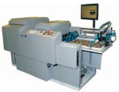 Чешская Komfi предлагает Spotmatic 54 (на фото) и Spotmatic 72 — системы, в общих чертах похожие на MGI JET Varnish