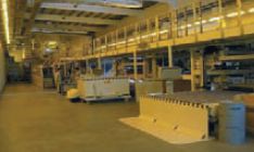 Примерно половина линии, резка и упаковка — за стенкой, там только красный свет