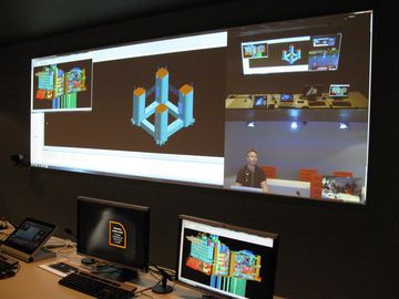 А вот такая студия, развернутая у заказчика – в компании Aker Solutions, занимающейся оборудованием для нефтегазодобычи. Примечательно, что в студию интегрирована система 3D-проектирования, которая позволяет совместно работать командам, разбросанным по всему миру