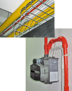 Желтая труба относится к системе пожаротушения, красная — к системе раннего пожарообнаружения. Она забирает воздух для анализа, при обнаружении малейших признаков продуктов горения в диспетчерскую подается соответствующий сигнал.