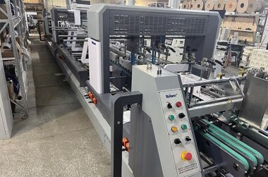 Фальцевально-склеивающая линия ROLAM установлена в «Типография ВК»