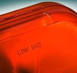 Чернила Linx: чёткость маркировки и штрихкодов на замасленных поверхностях