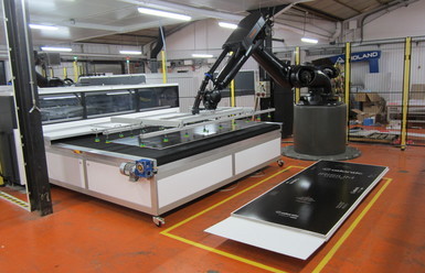 Clinchtech установила первую в мире роботизированную систему автоматизации для принтера HP Scitex