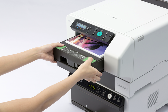 Начались продажи в России и странах СНГ принтера Ricoh Ri 100 для прямой печати на текстиле